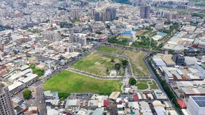 原為大公一用地，低度利用；重劃後為商業區、機關用地及公園等公設